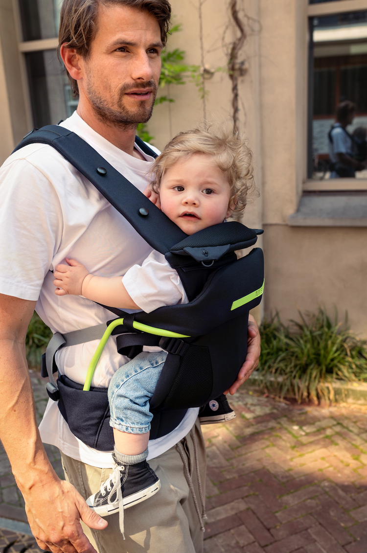 How can I prevent shoulder pain while carrying my baby in a carrier