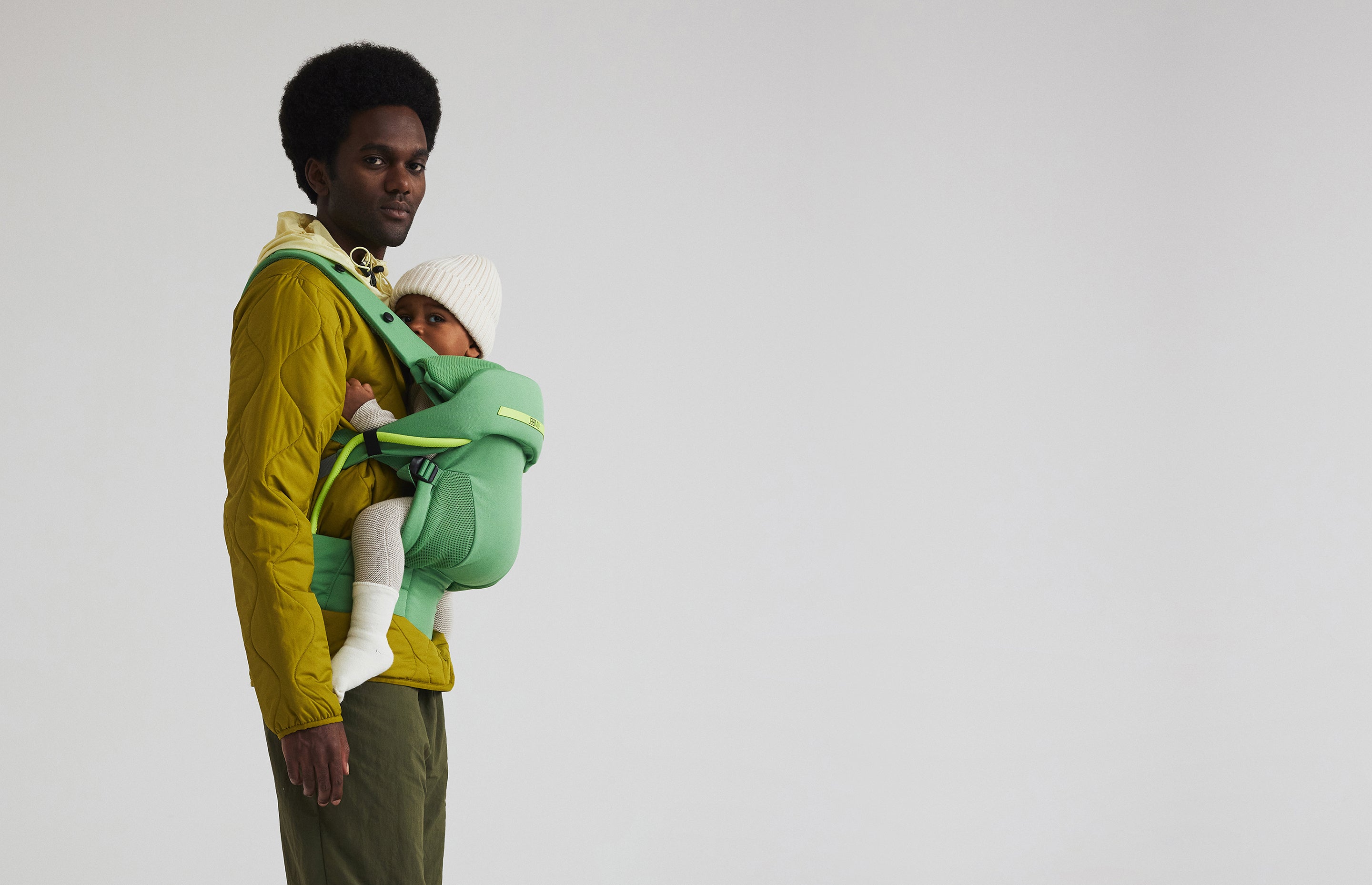 Green store baby carrier